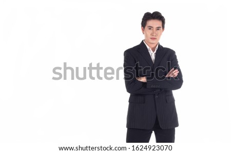 Portrait of young confident Thai businessman looking at camera smile on a white background isolated