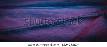 texture, background, pattern, pattern, chocolate, silk fabric, tight weaving, photo studio. Blue, midnight blue, denim fabric color, The play of light and shadow make this photograph unique,