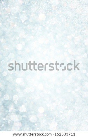 white and grey bokeh lights. defocused background