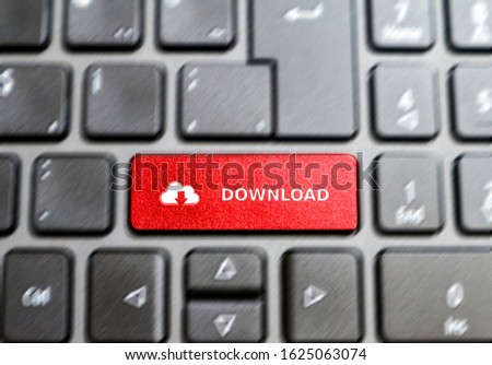 Red Download button on keyboard, concept of downloading content.Download and internet concept                                                             