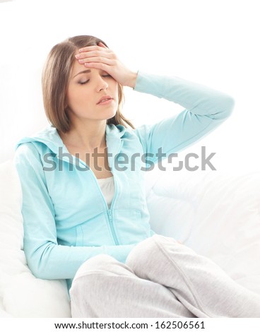 Girl suffering of the pain isolated on white background