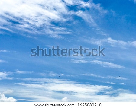 Clear blue sky and white fluffy clouds. Summer season.nature background