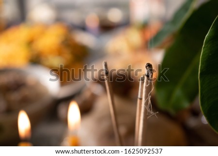 Incense and candles for showing respect to the gods or spirits of ancestors According to the beliefs of Buddhists on Chinese New Year.