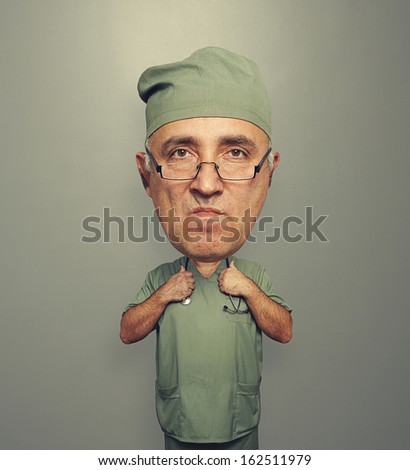 funny dissatisfied bighead doctor in uniform over grey background