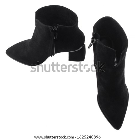 Black female leather high boots isolated on white background