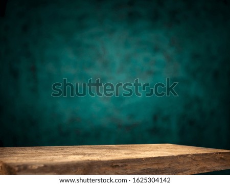 Focused tables with blurry foggy mint background.