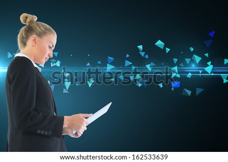 Composite image of blond businesswoman holding tablet