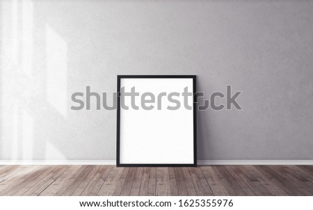 White blank poster with frame on wooden floor. 