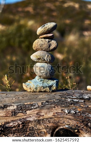 Balanced stones in the middle of the mountain