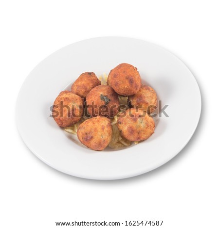 A dish of salt Cod Croquettes balls with straw potatoes