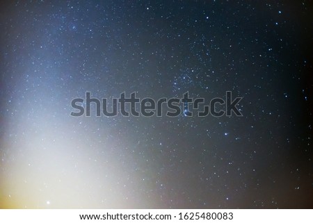 Star Sirius and Constellation Orion in the night sky.