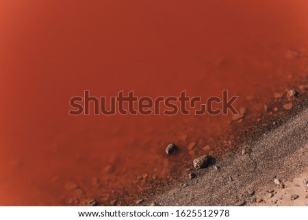 Masazirgo or Masazir Lake is a salty lake near of Baku, Azerbaijan. Water in lake is pink because have large volumes of chloride and sulphate are concentrated in ion composition  Royalty-Free Stock Photo #1625512978