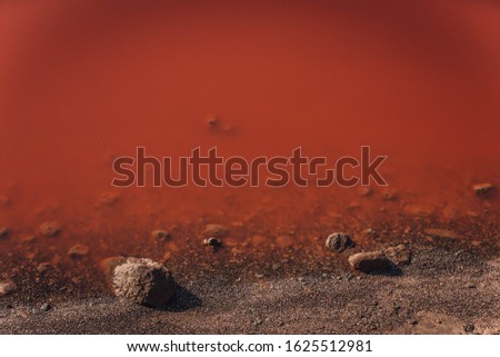 Masazirgo or Masazir Lake is a salty lake near of Baku, Azerbaijan. Water in lake is pink because have large volumes of chloride and sulphate are concentrated in ion composition  Royalty-Free Stock Photo #1625512981