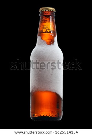 Beverage Beer Brow Bottle Frost and icy Effect isolated in black for overlay