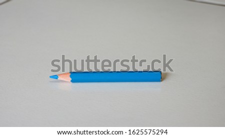close up of the blue pencil on the table Royalty-Free Stock Photo #1625575294
