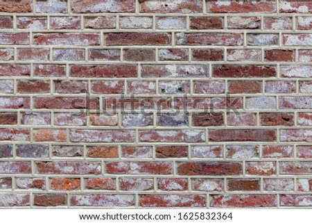 Brick wall background, Abstract geometric pattern, Old white and red brick block texture, Outdoor building wall, Can be used as background for display or montage your products.