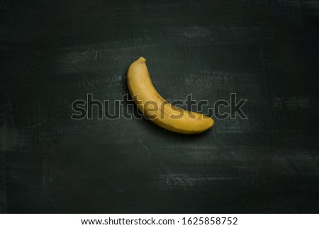 Art installation banana taped to a wall