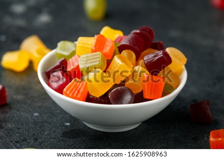 A mix of Midget Gems candy in white bowl. sweet food Royalty-Free Stock Photo #1625908963