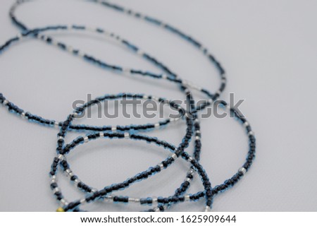 Colorful  beads  on white background