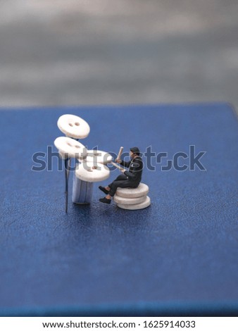 drummer miniature creations made of buttons