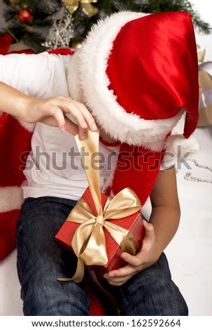 Christmas Kids. Happy Children Opening Gifts. New Year. Christmas Tree 