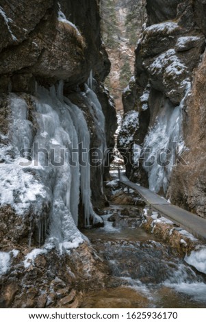 Frozen icicles on the walls of rocks