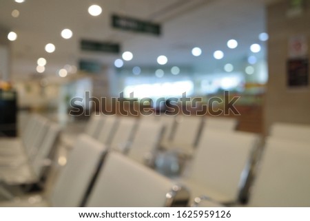 Blur focus of  waiting area seats.Public building waiting area. Hospital interior detail. Nobody. Horizontal