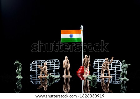 26th Jan Republic Day, Indian Flag indian army protecting the flag along side the border, toys, tricolor, saffron, green and white color, 26 January republic day concept