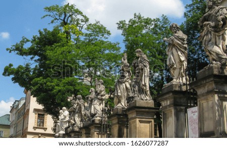 sculptures in front of Church of St. Peter and St. Paul, Krakow, Poland Royalty-Free Stock Photo #1626077287