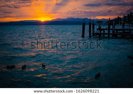 sunset over lake garda seen from sirmione