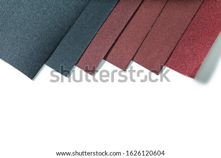 sheets of abrasive paper isolated on white background very close up Royalty-Free Stock Photo #1626120604