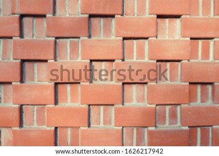 A red brick wall background