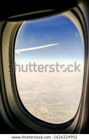 view from airplane window, digital photo picture as a background