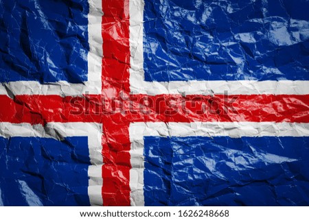 National flag of Iceland on crumpled paper. Flag printed on a sheet. Flag image for design on flyers, advertising.