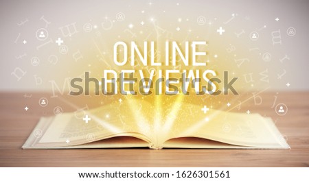 Open book with ONLINE REVIEWS inscription, social media concept