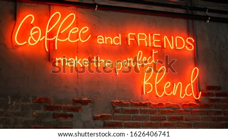 Coffee and Friends make the prefect blend textures. decorative neon graffiti. neon writing on brick wall Royalty-Free Stock Photo #1626406741