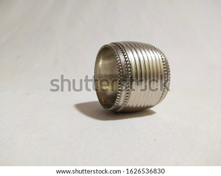 metal ring with bull and white back ground