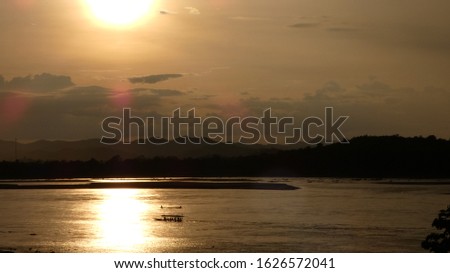 Sunset in Laos on the Mekong river