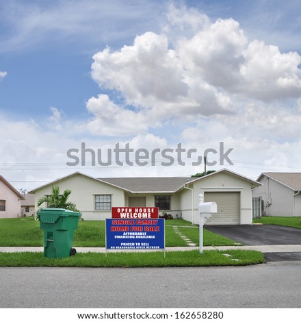 Real Estate Open House For Sale Sign Suburban Ranch Style Home Recycle Trash Day Residential Neighborhood USA Blue Sky Clouds