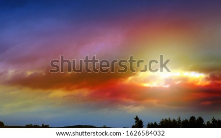 Big colorful clouds background and sunset. Sky background.