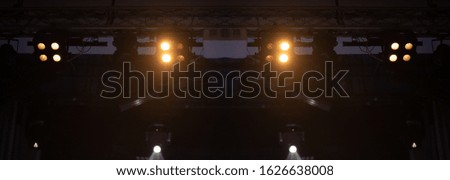 Theater lights spotlights over the stage, texture background for design.