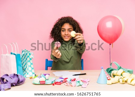Young african american woman planning a birthday