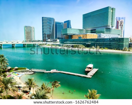 Modern architecture of Al Maryah Island in Abu Dhabi rising across the seaside