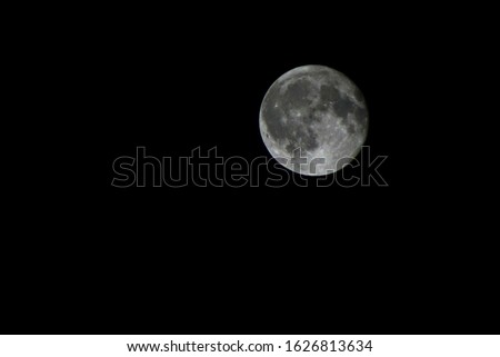 Full moon in a dark night