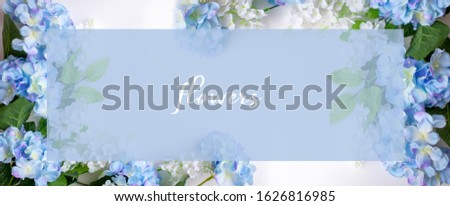 Flower frame, banner. Postcard with blue hydrangea flowers on a white background. Space for text