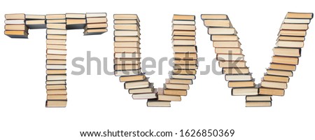 T U V letter from books. Alphabet isolated on white background. Font composed of spines of books