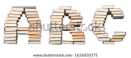 A B C letter from books. Alphabet isolated on white background. Font composed of spines of books