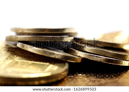 Close up shot of stacked golden coin isolated