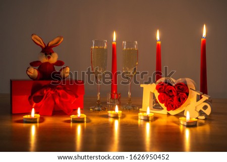 Valentines day romantic decoration with wine glasses