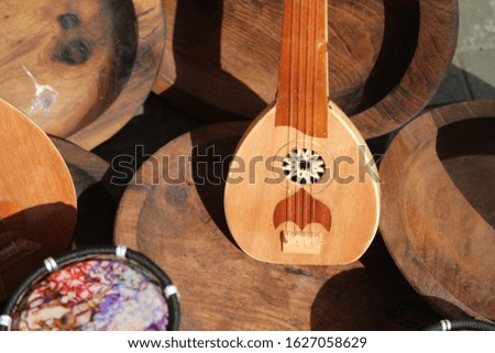 Close up of Moroccan musical instrument in the market Royalty-Free Stock Photo #1627058629
